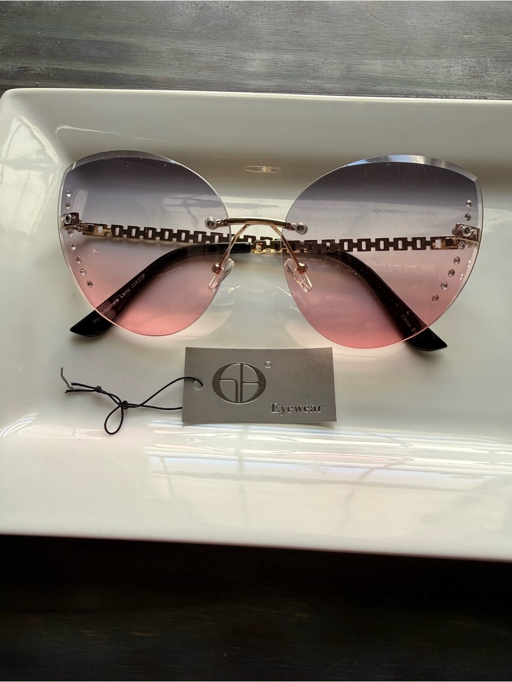 Eyewear Gradient Pink to Purple Rimless Sunglasses by